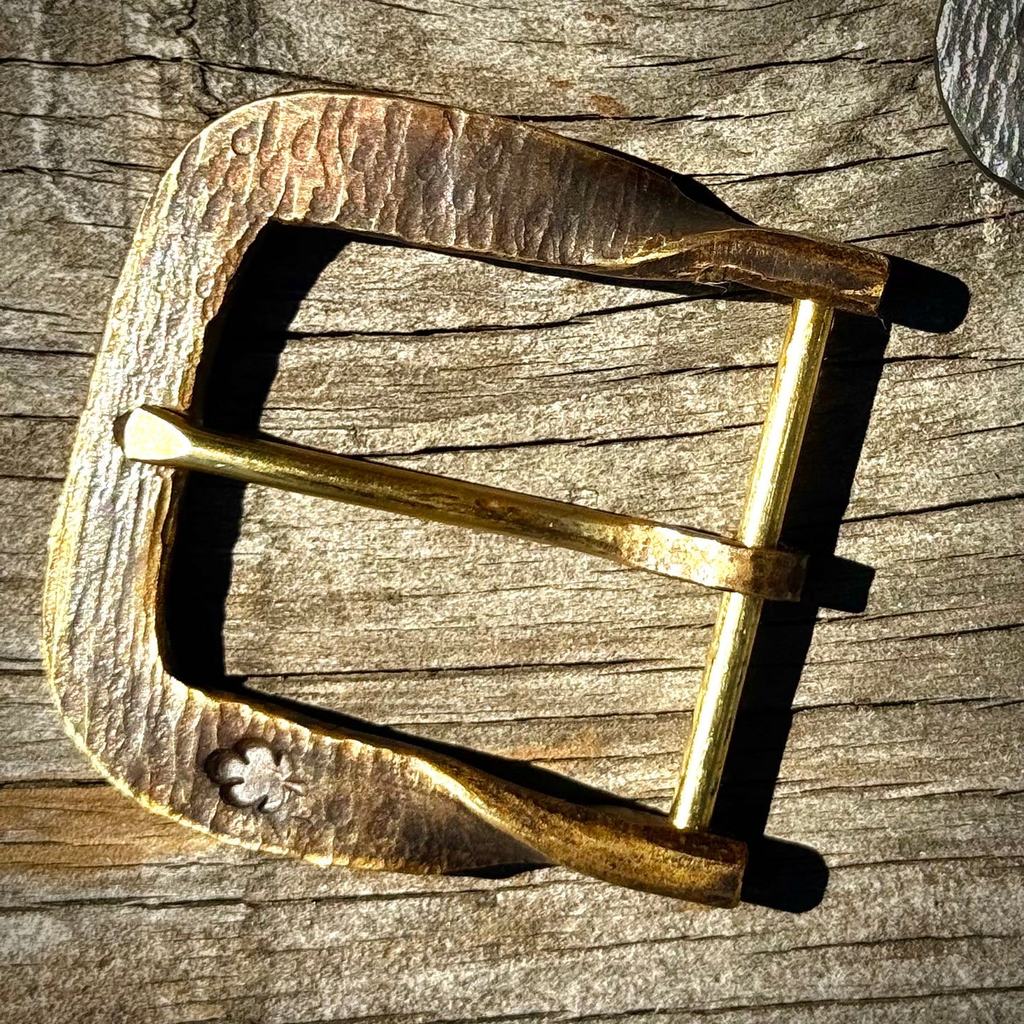 Hand forged belt buckle