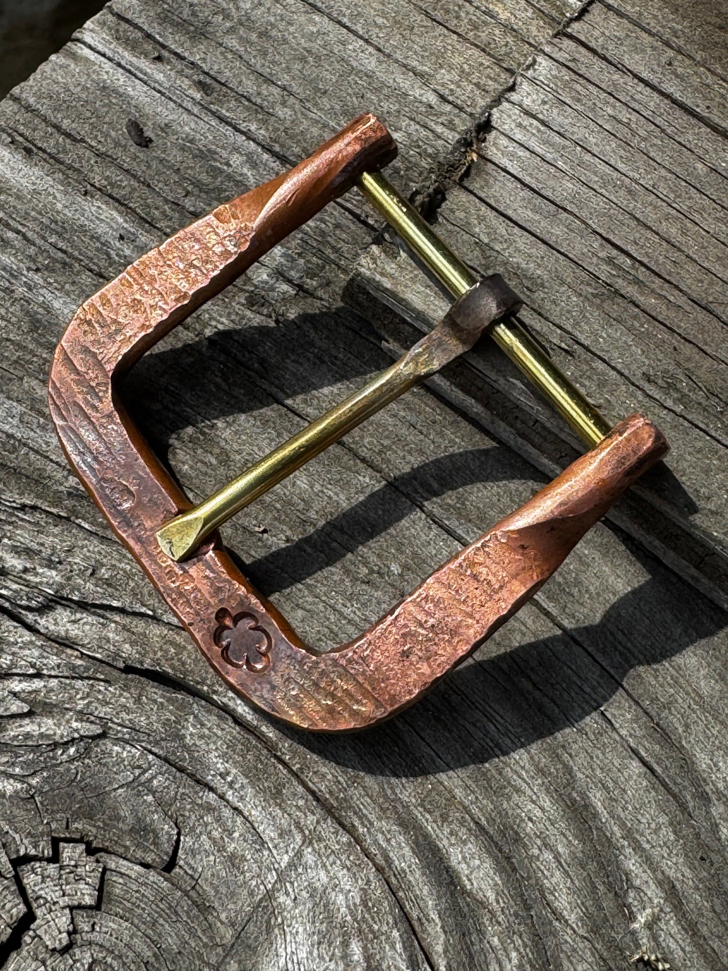 Hand forged belt buckle