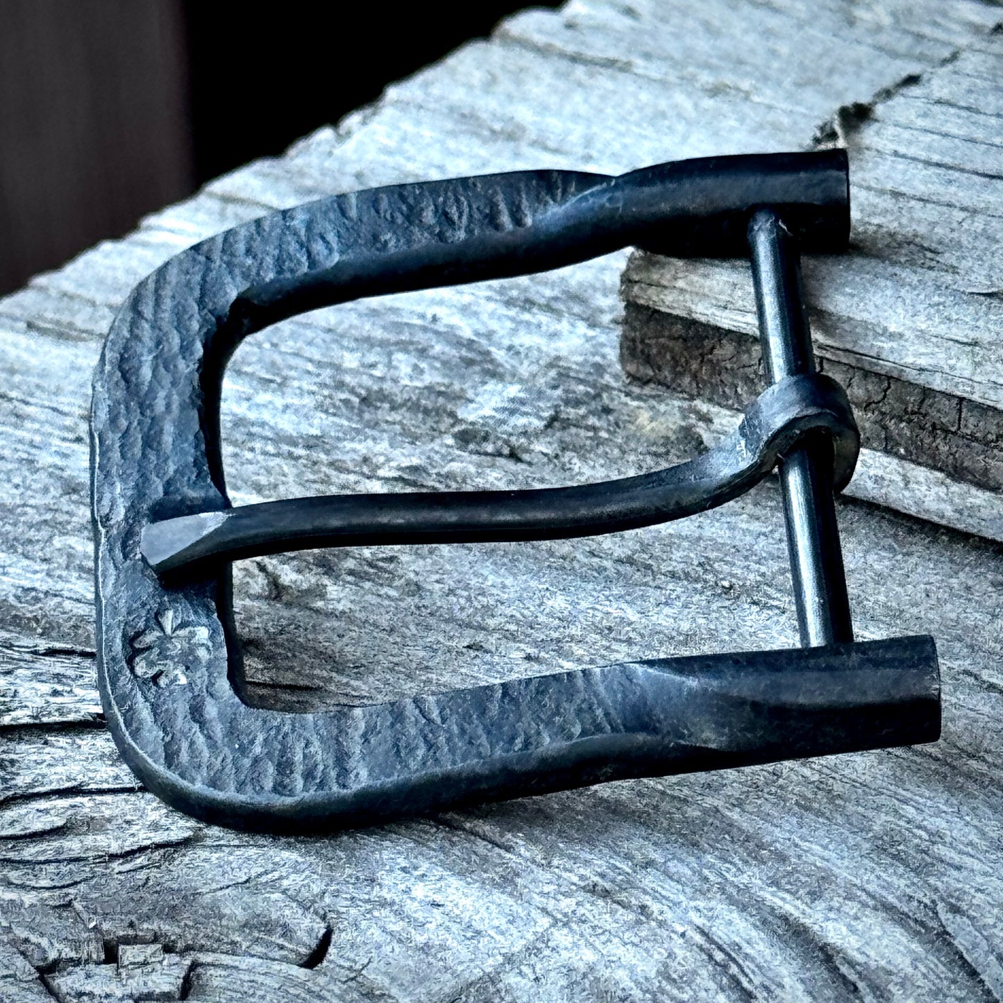 Hand forged belt buckle