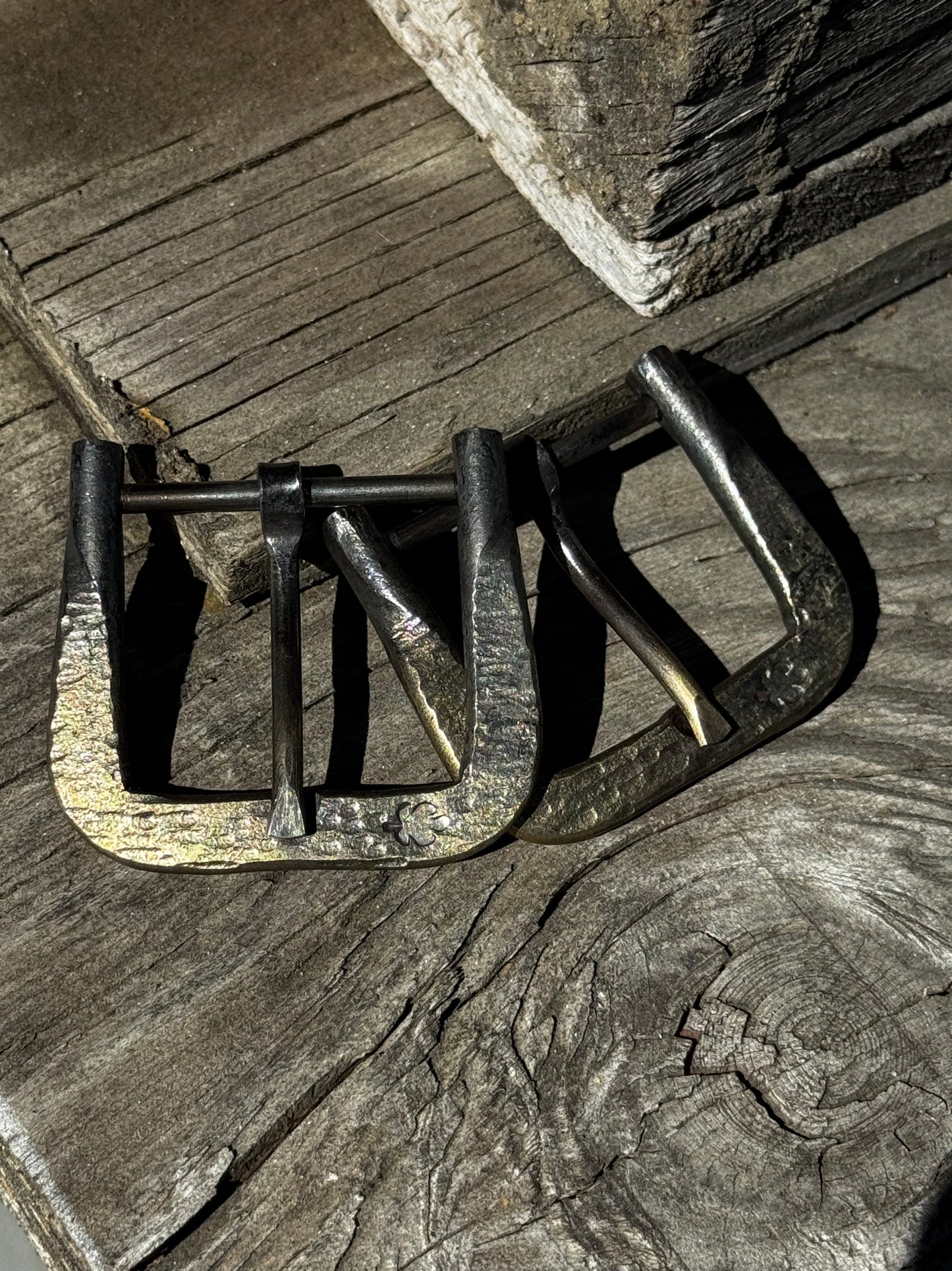Hand forged belt buckle
