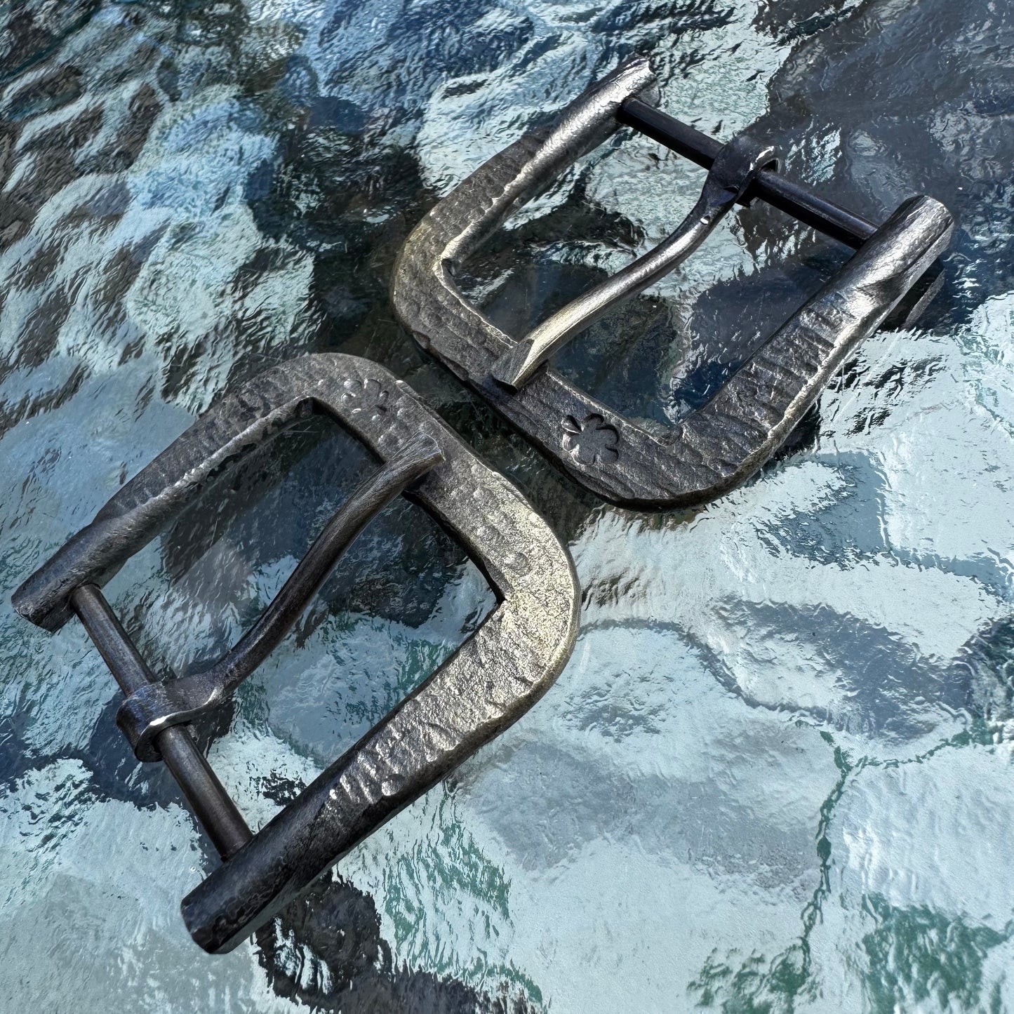 Hand forged belt buckle