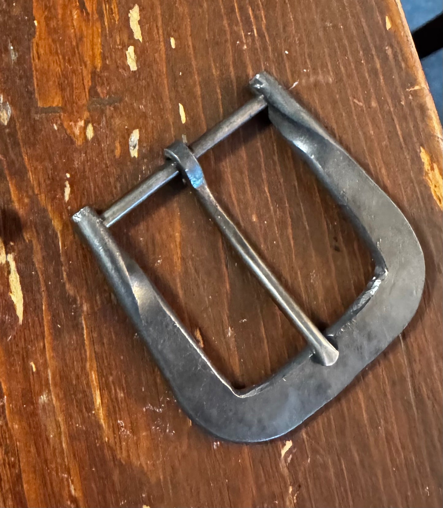 Hand forged belt buckle