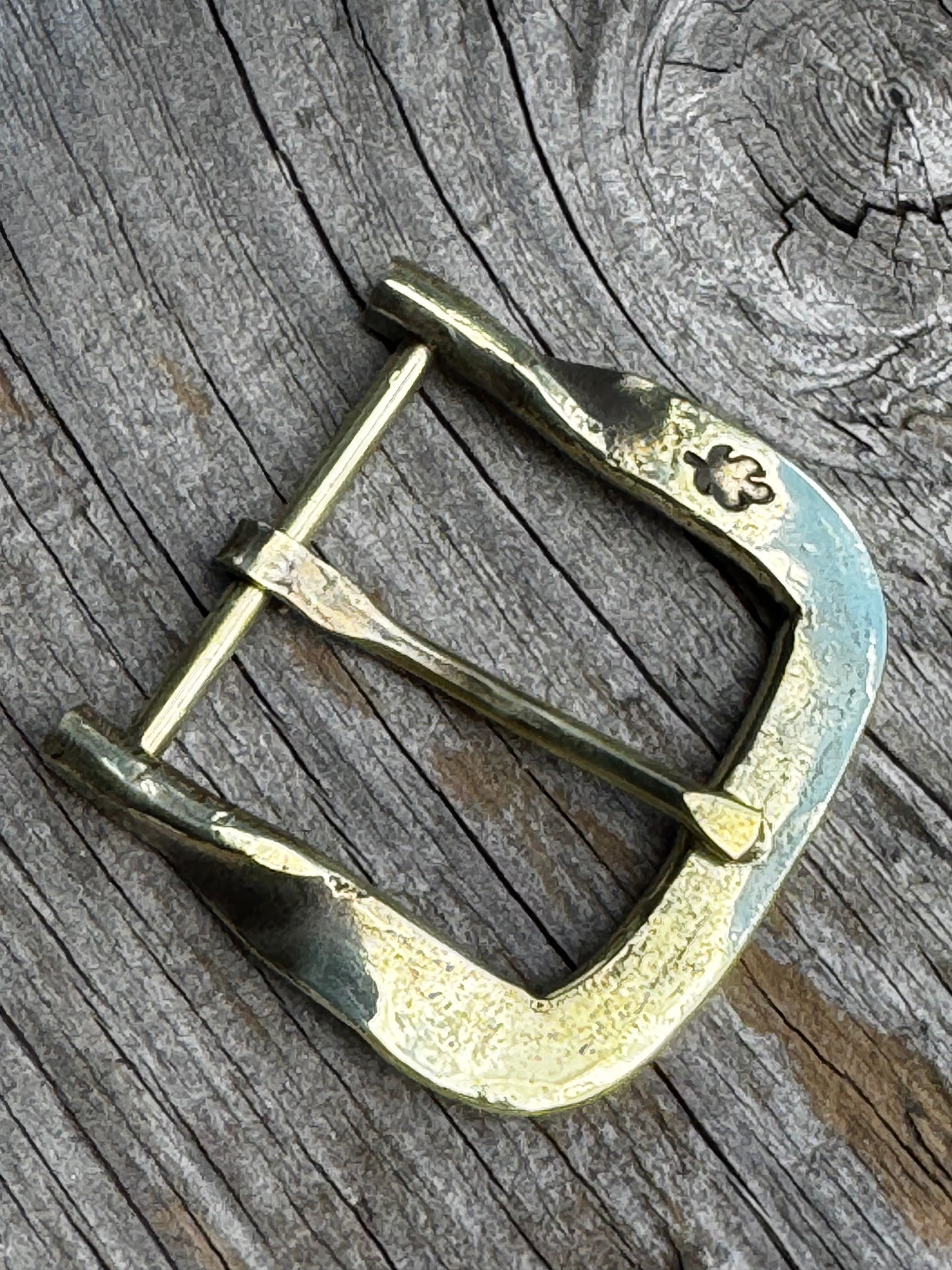 Hand forged belt buckle