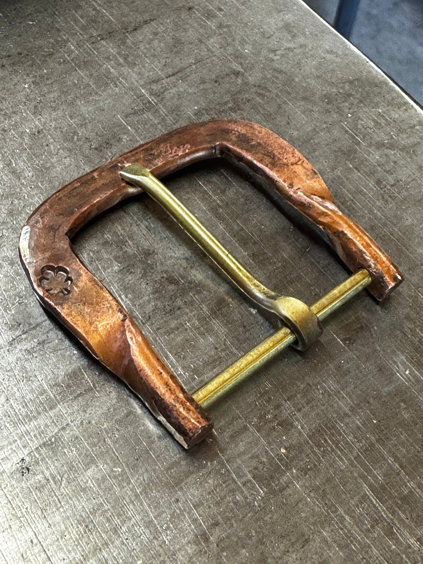 Hand forged belt buckle