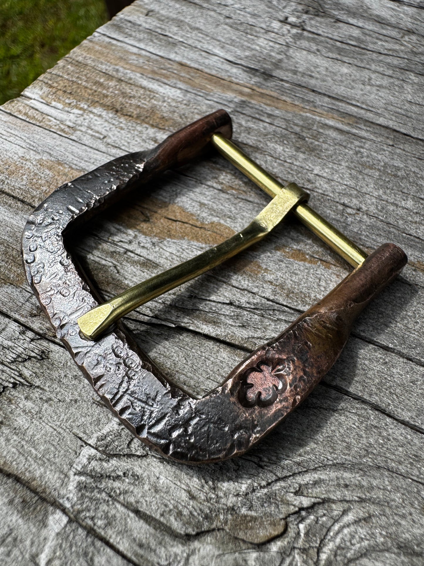Hand forged belt buckle