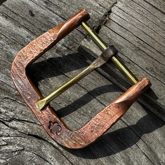 Hand forged belt buckle
